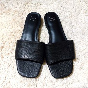 Black flat sandals